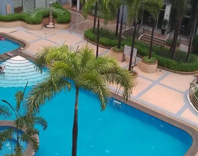 Апартаменты Sheila's Condotel At One Palm Tree