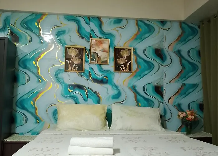Апартаменты Sheila's Condotel At One Palm Tree *