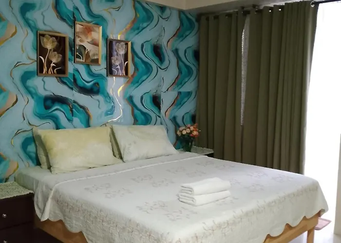 Апартаменты Sheila's Condotel At One Palm Tree
