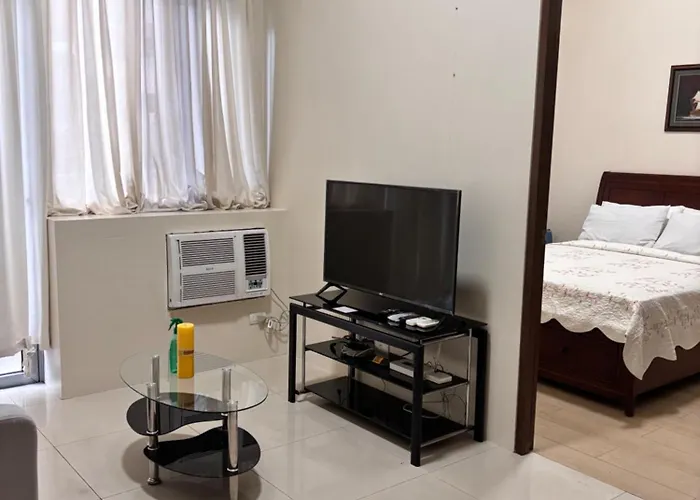 Апартаменты Sheila's Condotel At One Palm Tree