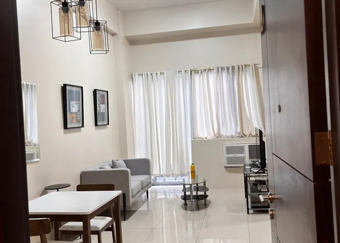 Апартаменты Sheila's Condotel At One Palm Tree