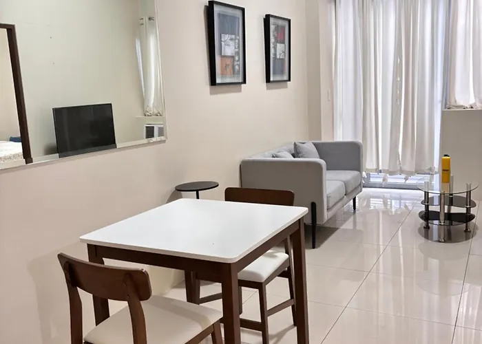 Апартаменты Sheila's Condotel At One Palm Tree